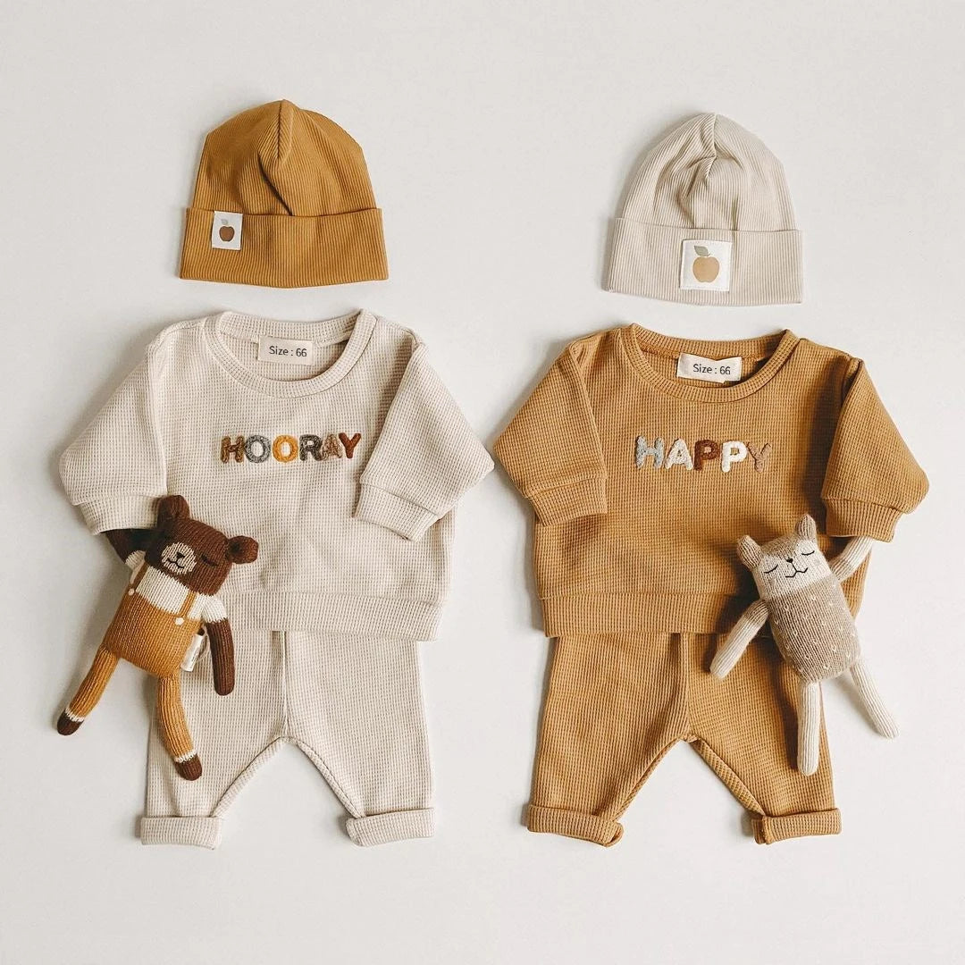 Side view of the baby clothing set