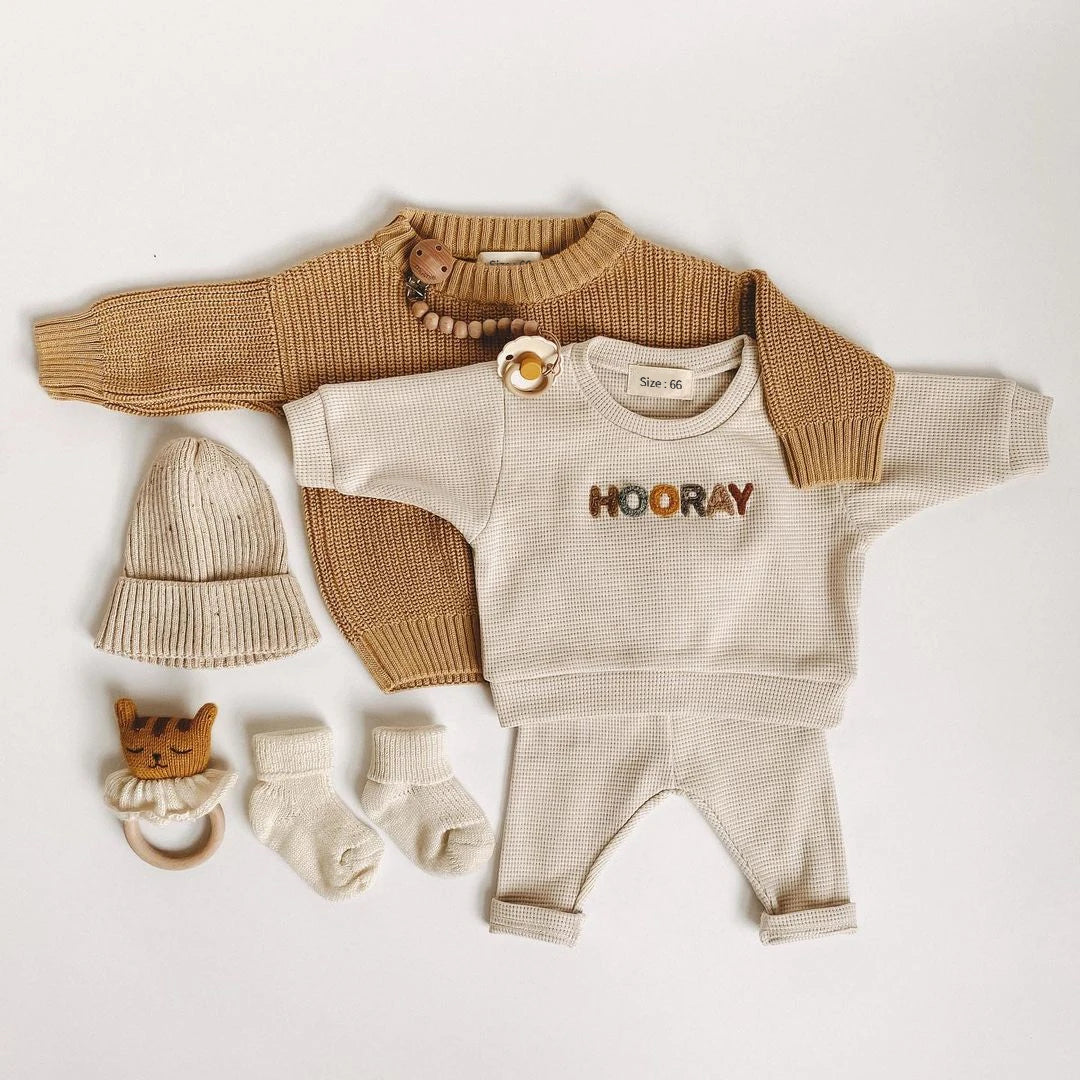 Back view of the baby clothing set